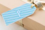 custom made zaadpapier gift tag met gouden lint