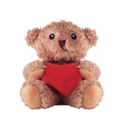 pluche teddybeer houdt rood hartje vast