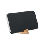 kabelset in koker deksel als telefoonstandaard