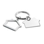2-delige metalen sleutelhanger i.v.v. een huis.