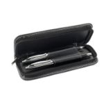 metalen balpen en rollerpen in een pu etui