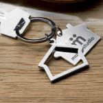 2-delige metalen sleutelhanger i.v.v. een huis.
