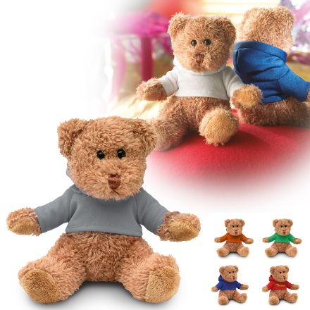 pluche teddybeer in een sweater met capuchon.