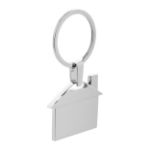 metalen sleutelhanger in de vorm van een huis.