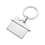 metalen sleutelhanger in de vorm van een huis.
