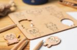 kleurvorm-matchingspel berkenmultiplex in jute zak