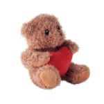 pluche teddybeer houdt rood hartje vast