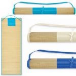 strandmat van natuurlijk stro met draagriem