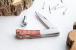 roestvrij stalen zakmes met houten coating