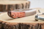 roestvrij stalen zakmes met houten coating