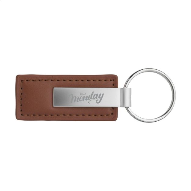 mat metalen en imitatieleren sleutelhanger.